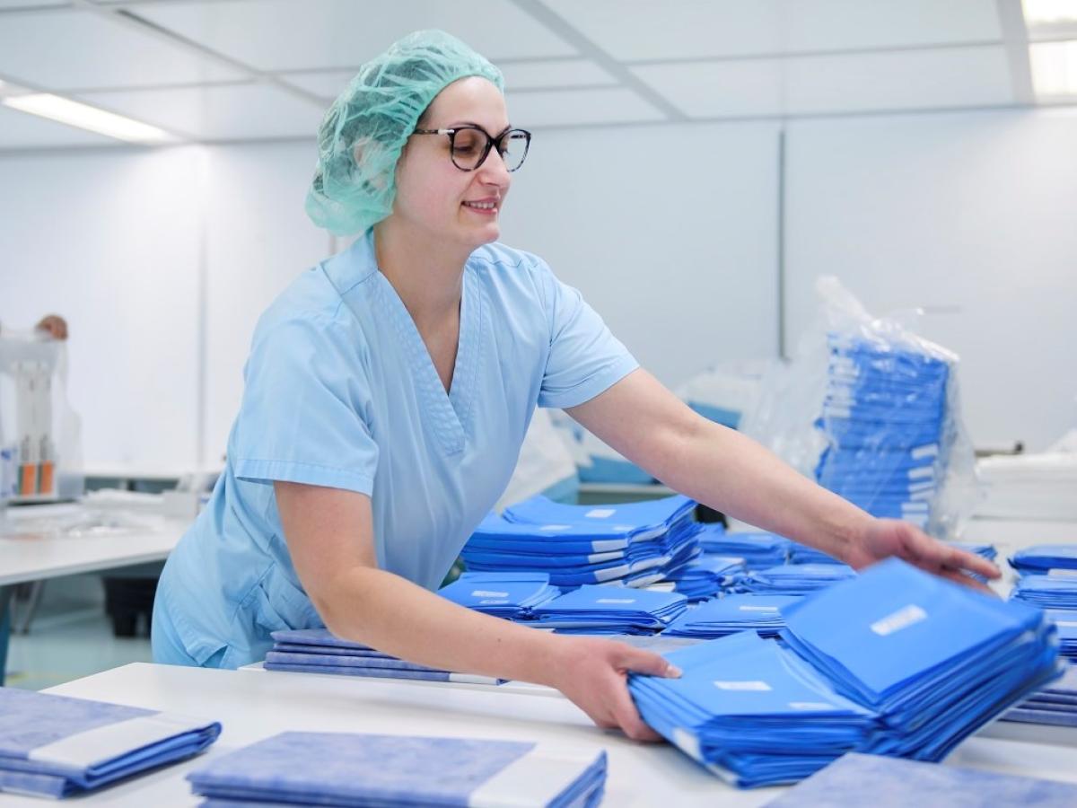 Employee working in the white room